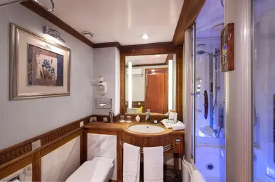 a bathroom with a sink and a shower at Sonesta St George Nile Cruise - Luxor to Aswan 4 Nights from Monday to Friday in Luxor