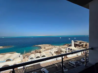 a view of the ocean from a balcony at jasmin kal in Hurghada