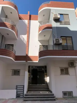 an external view of a building with a door at BS Lodging 15 - Next to Dream Beach in Hurghada