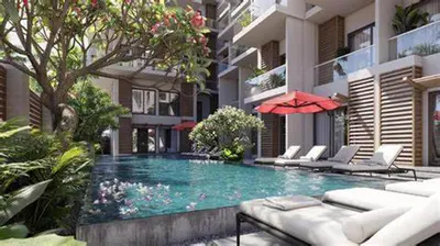a swimming pool in the middle of a building at 2 Bed Resort Apartment - Sleeps 4 - Hotel Services in Hurghada