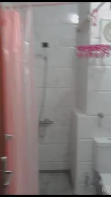 a blurry picture of a bathroom with white cabinets at ستوديو كومباوند طيبة فيو in Hurghada