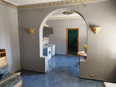 a hallway with an archway in a house at Gabawy Garden Ferienwohnung in Luxor