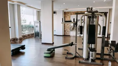 a gym with treadmills and machines in a room at Sea View at Gravity Sahl Hasheesh 7 Pools & Beach-FOR GUESTS WITH NONEGYPTIAN PASSPORTS in Hurghada