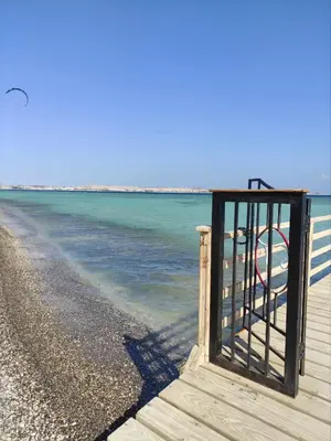 a view of the ocean from a pier at Buki-Gravity-Homes, Ap No2, seaview , HEATED pool, 5 star resort Gravity Sahl Hasheesh-FOR GUESTS WITH NONEGYPTIAN PASSPORTS in Hurghada