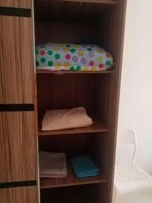a cupboard with a bed on top of it at Makramia studio in Hurghada