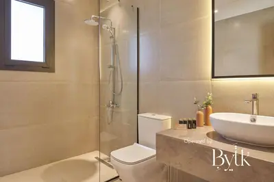 a bathroom with a toilet and a sink and a shower at BYTK - Casa Del Mar in Hurghada