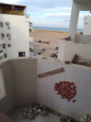 a room with a heart on the side of a building at Tiba View flat near pool in Hurghada