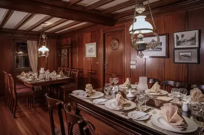 a dining room with a long table and chairs at JAZ Farouz El Nil III Nile Cruise - Every Saturday from Luxor for 07 & 05 Nights in Luxor