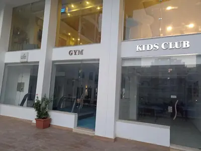 a store front of a kids club with glass windows at Ubytovani v novém resortu Aqua Tropical poblíž El Gouny in Hurghada