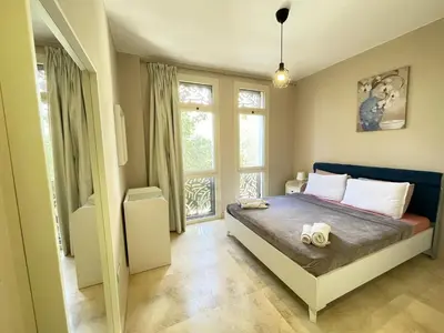 a bedroom with a bed and a large window at El Gouna Mangroovy 1-Bedroom Sleeps 4-Persons, M8-4C-14 in El Gouna