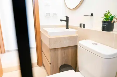 a bathroom with a sink and a toilet at Makadi Heights Elite Worldwide Residences - Hurghada, Egypt in Hurghada