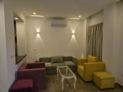 a living room with a couch and two chairs at Noura Luxury Hotel Villa with free Pool and Beach access in Hurghada in Hurghada