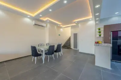a dining room with a table and chairs at unique villa with heated pool and Spa in Hurghada