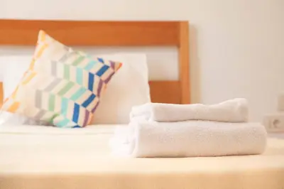 a pile of towels sitting on top of a bed at Modern Soma Bay 2BR Villa w sea views, beach & pool access in Hurghada