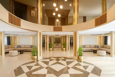 a lobby with couches and tables in a building at Five Star Deluxe River Kruz from Aswan to Luxor 3 Nights in Aswan
