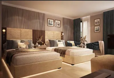 a large bedroom with two beds and a couch at Royal Cruise Aswan to Luxor 3 Night And visit the Nubian village in Luxor