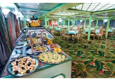 a buffet line with many different types of food at Royal Cruise Aswan to Luxor 3 Night And visit the Nubian village in Luxor
