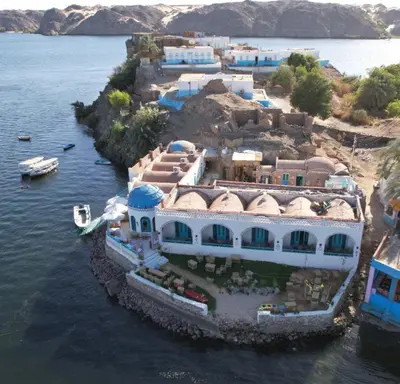 an aerial view of a house in the water at Miskaa Nubian House in Naj‘ Tinjār