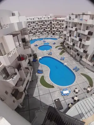 an aerial view of an apartment complex with a pool at Tiba view in Hurghada