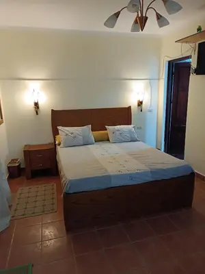 a bedroom with a large bed in a room at sahl hashesh makadi- hurghada- in Hurghada