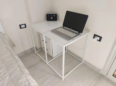a white desk with a laptop on top of it at Studio Cleopatra Resort in Hurghada