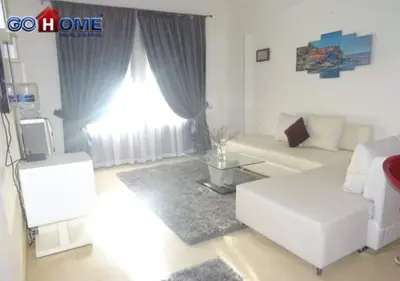 a living room with a white couch and a window at Apartment -Y97-0-8- 1 BR Sabina in Hurghada