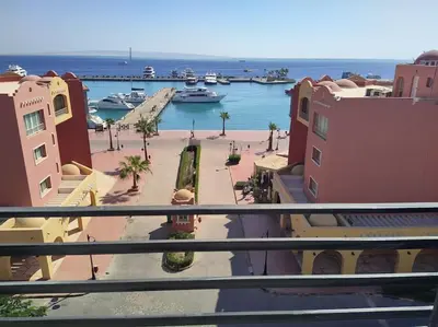a view of a harbor with boats in the water at Condo with Breathtaking 's view with 2 bedrooms in Hurghada