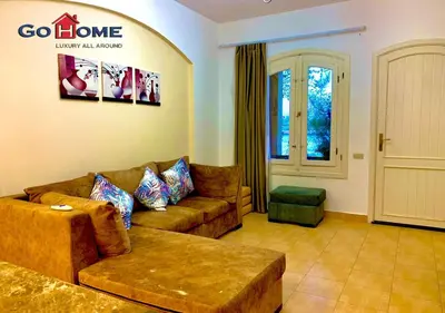 a living room with a couch and a table at Friendly 1 Bed Room Y12 -0 West Golf at El-Gouna in Hurghada