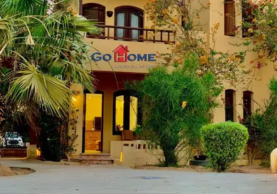 a building with a sign that says go home at Friendly 1 Bed Room Y12 -0 West Golf at El-Gouna in Hurghada