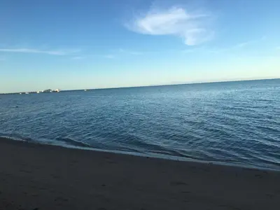 a view of the ocean from the beach at Fox House Resort Apartment in Hurghada