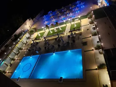 an overhead view of a swimming pool at night at Casablanca star Beach Hurghada كازابلانكا ستار بيتش الغردقة in Hurghada