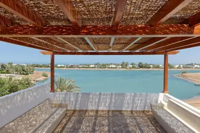 a view of a body of water from a patio at White Villa with open lagoon view in Hurghada