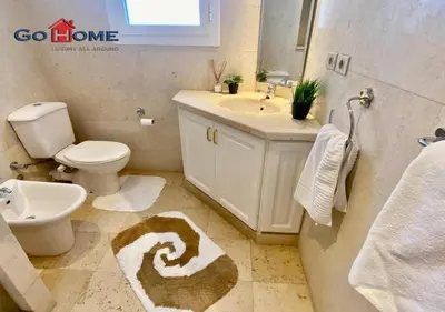 a bathroom with a toilet and a sink at Unique Villa 6 B Rooms Villa 38 at El-Gouna in Hurghada