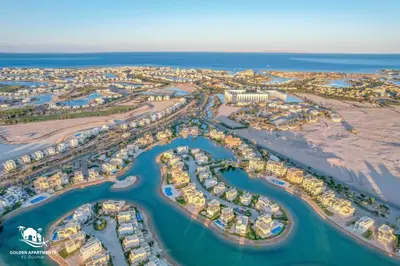 an aerial view of a resort near the ocean at Ultimate Beachstyle Getaway Gouna 2BR Twinhouse. BBQ, Lagoon & Pool Access in Hurghada