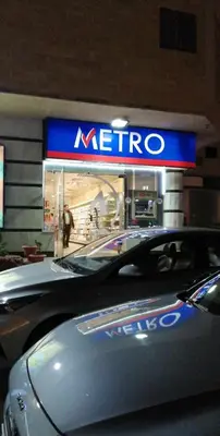 a car parked in front of a metro store at Sheraton street METRO in Hurghada