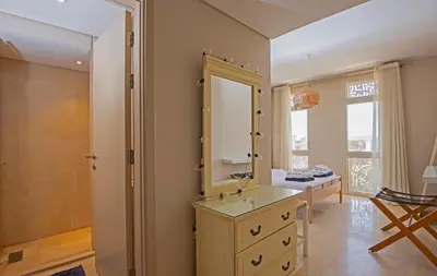 a bathroom with a sink and a mirror at Ollystays Mangroovy 1 BR Beach and Pool Free access in Hurghada