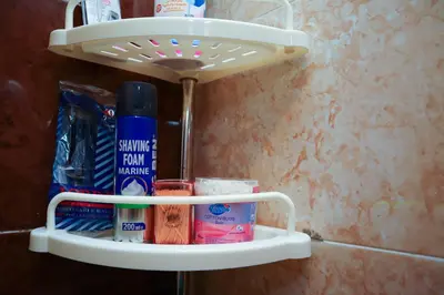 a shelf in a bathroom with products on it at Hostgool Beach Chalets Mirage bay resort & aqua park in Hurghada