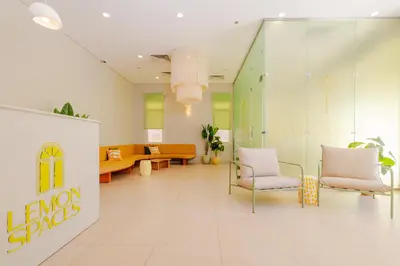 a lobby with two chairs and a waiting room at Boutique Residence Mangroovy-Lemon Spaces Gouna in Hurghada