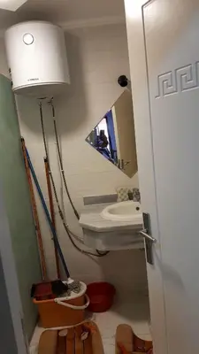 a bathroom with a lamp and a sink and a mirror at Turtles beach resort hourghada studio view sea view pool private beach jacuzzi security air-conditioned Cafe restaurant on the beach and a large sunny balcony in Hurghada