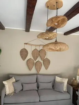 a living room with a couch and two hanging hearts at 2BR beautiful home in Bali Gouna in Hurghada