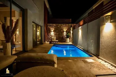 a swimming pool in the middle of a house at 2BR beautiful home in Bali Gouna in Hurghada