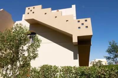 a building with a painting on the side of it at Beautiful 2-Bed Villa in Makadi Heights in Hurghada