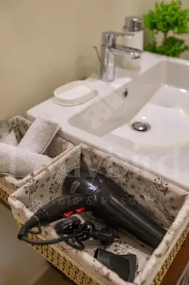 a bathroom with a sink and a sink at Ladybird - Veranda Highline in Hurghada