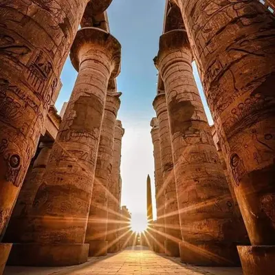 a sunbeam shines through the columns of a building at Nile Cruise from Aswan to Luxor 3 Night And Luxor to Aswan 4 Night in Jazīrat al ‘Awwāmīyah