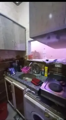 a kitchen with a sink and a counter top at Hurghada in Hurghada