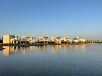 a large body of water with buildings in the background at El Gouna Cyan Villa with pool n lagoon by BFG Beit Fel Gouna in Hurghada