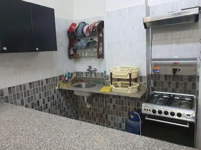 a kitchen with a sink and a stove at Hurghada city center in Hurghada