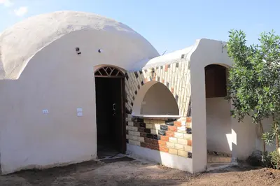 an entrance to a building with an arched doorway at Happy house in Luxor