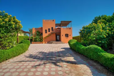 a house with a pathway leading to a building at Wast golf Y 41 in Hurghada