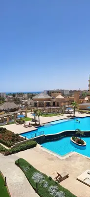 a view of a swimming pool at a resort at Egypt Traveler Hotel in Hurghada